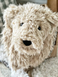 A plush puppy dog lovey handmade by ClaraLoo with soft tan faux fur. This puppy dog blanket has a black nose and black eyes.